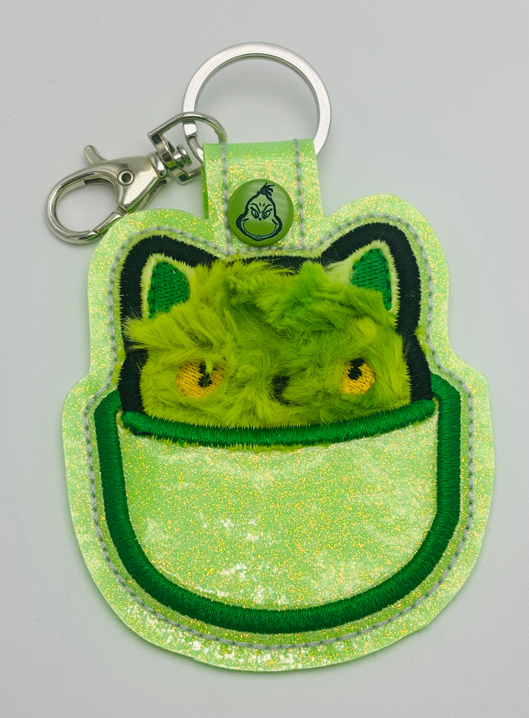 Grinchy Kitty in a Cup Keychain